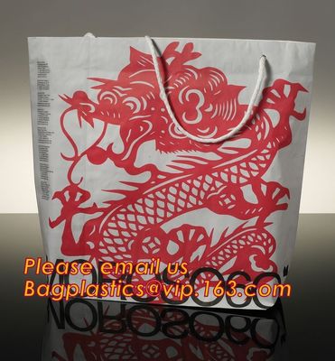Luxury matte black shopping paper bag with logo UV for clothing packaging